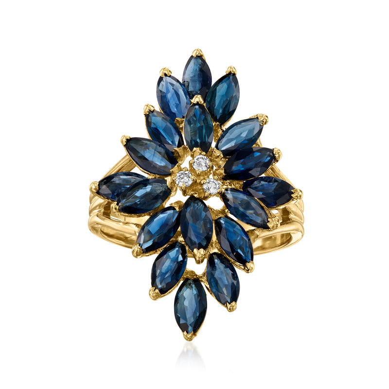 Vintage yellow gold ring with blue marquise sapphire flower cluster and diamond center