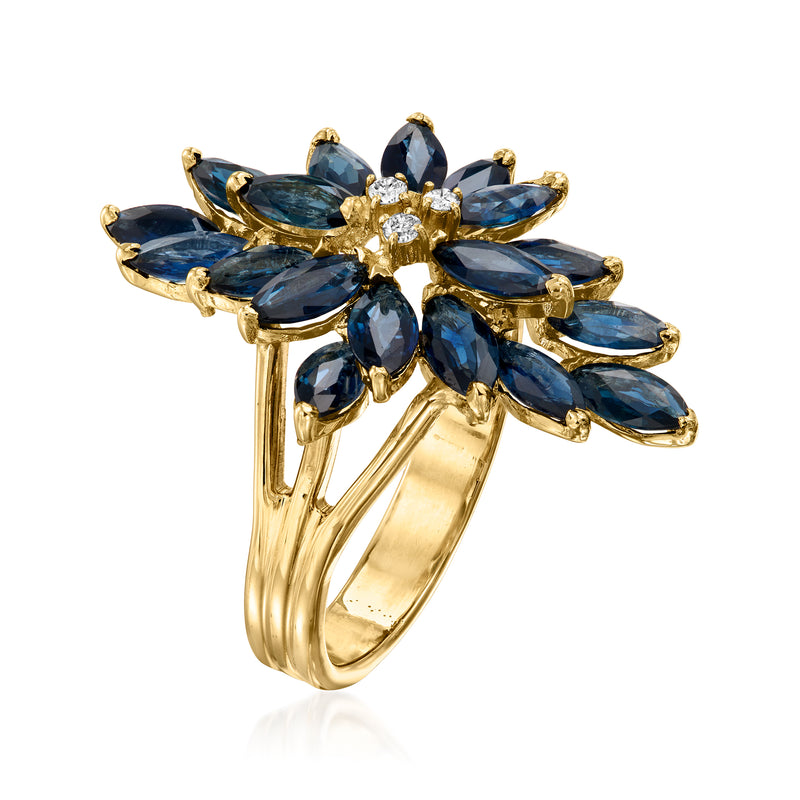 Yellow gold ring featuring blue marquise sapphire petals with small diamond accents