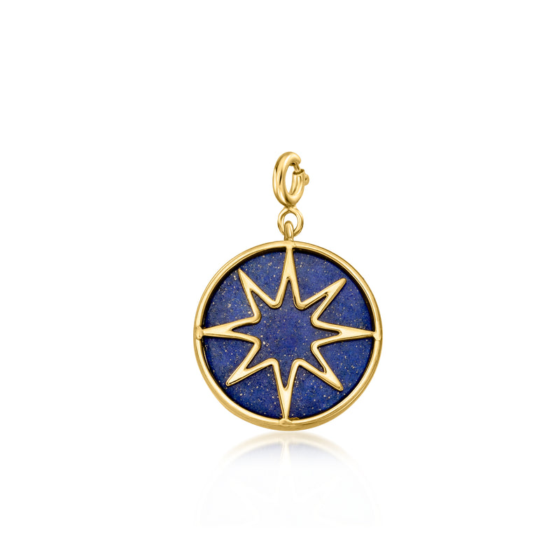 Gold reversible charm with blue disc and outlined star motif