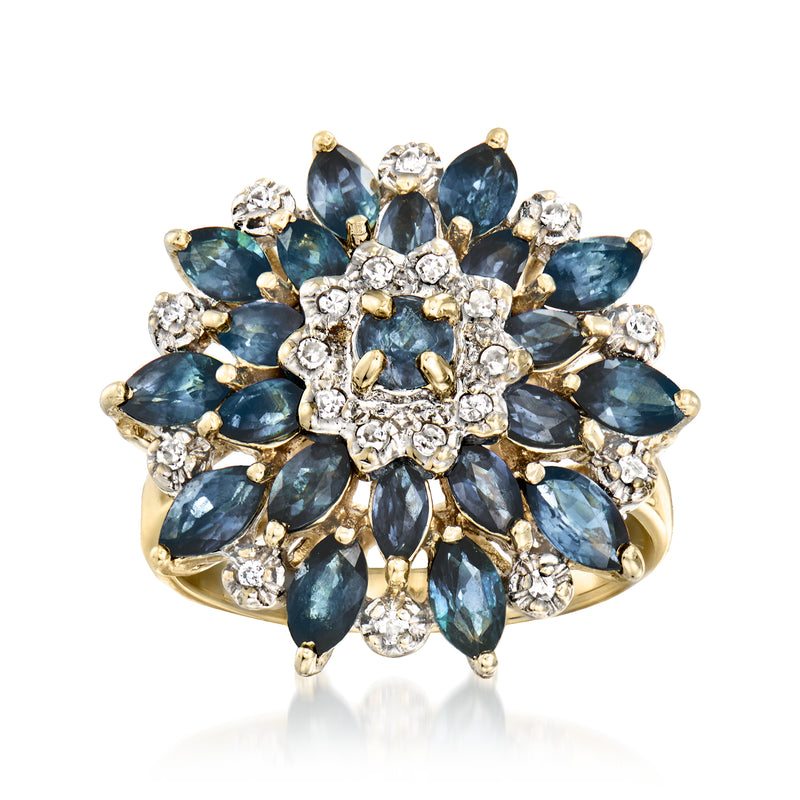 14kt yellow gold flower ring with blue sapphires and diamond accents