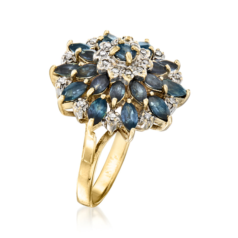 Side view of 14kt yellow gold flower ring with blue sapphires and diamonds