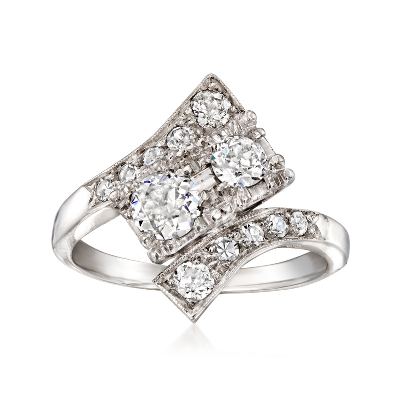 Platinum diamond bypass ring with square center and three stone halo, vintage style