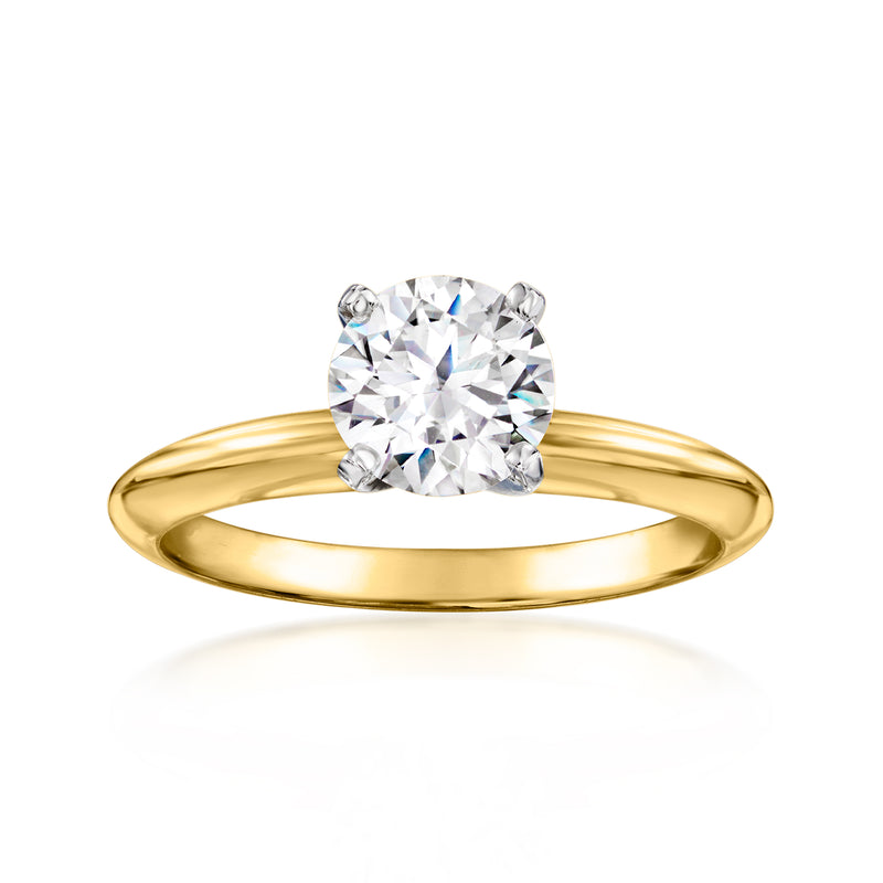 14kt yellow gold solitaire diamond ring with round center stone and four prongs