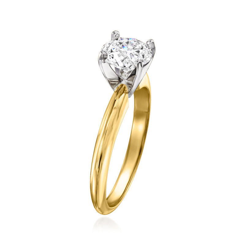 14kt yellow gold solitaire diamond ring, round stone in silver-toned prongs