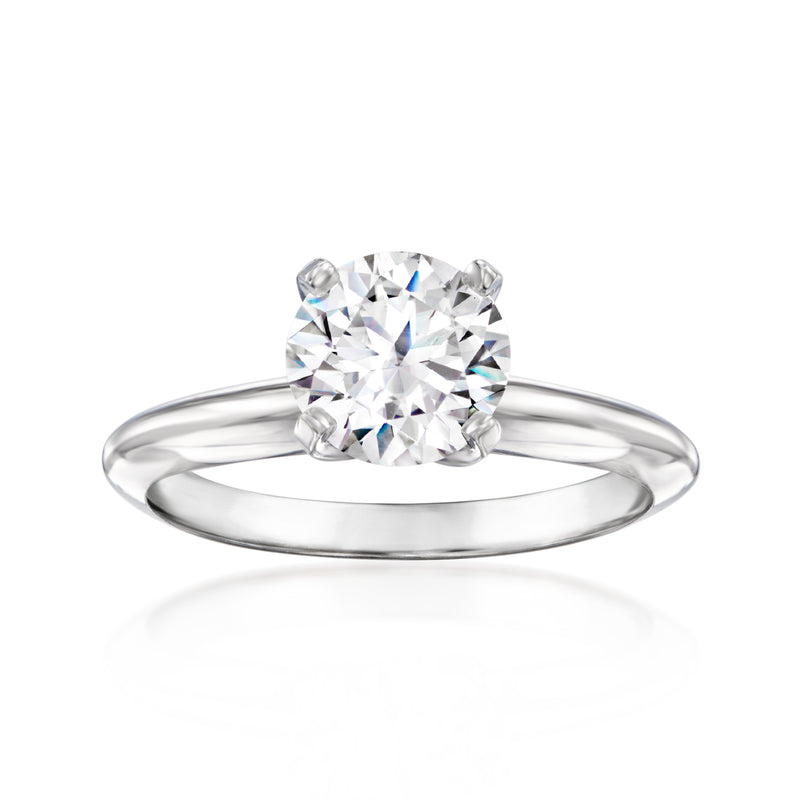 14kt white gold solitaire diamond ring with round center stone, four prongs