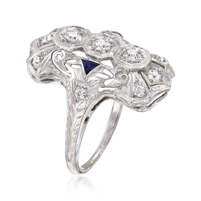 Vintage white gold ring, oval and round diamond settings with blue sapphire side details