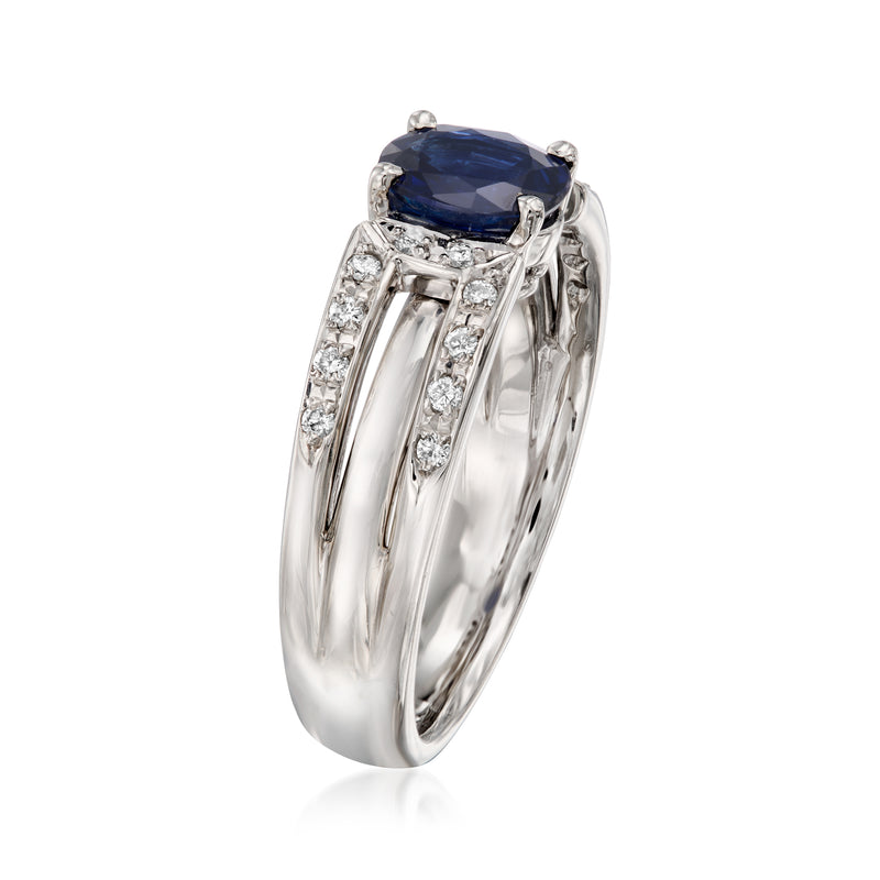 Platinum oval sapphire ring with side prongs and surrounding diamond accents