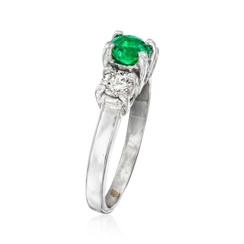 14k white gold emerald and diamond ring, oval green gemstone in prong setting