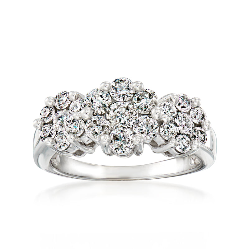 White gold diamond floral cluster ring with round stones and curved band