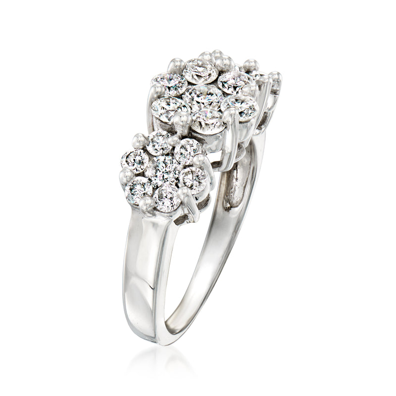 White gold diamond floral cluster ring, side view with prong-set round stones