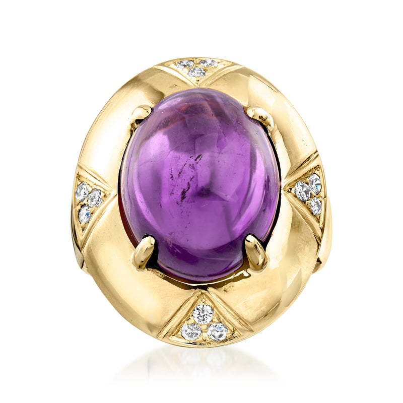 Oval amethyst ring in 14kt yellow gold with diamond accents around bezel