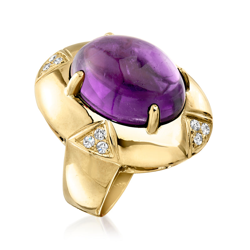 Side view oval amethyst cabochon ring in 14kt yellow gold with diamond set shoulders