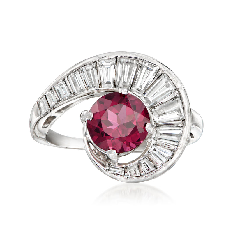 Platinum vintage swirl ring with oval pink rhodolite garnet and baguette diamond sides