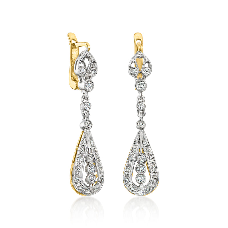Two-tone 14kt gold diamond drop earrings with teardrop dangle and top studs