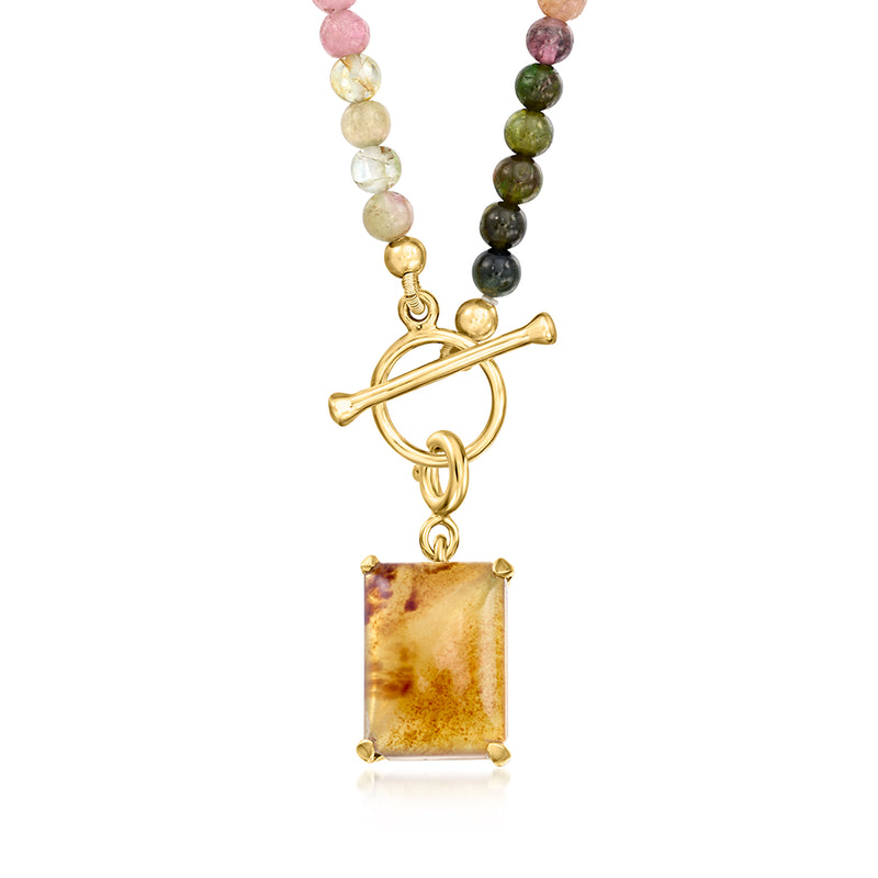 Square amber charm pendant in gold setting on rainbow beaded necklace strand