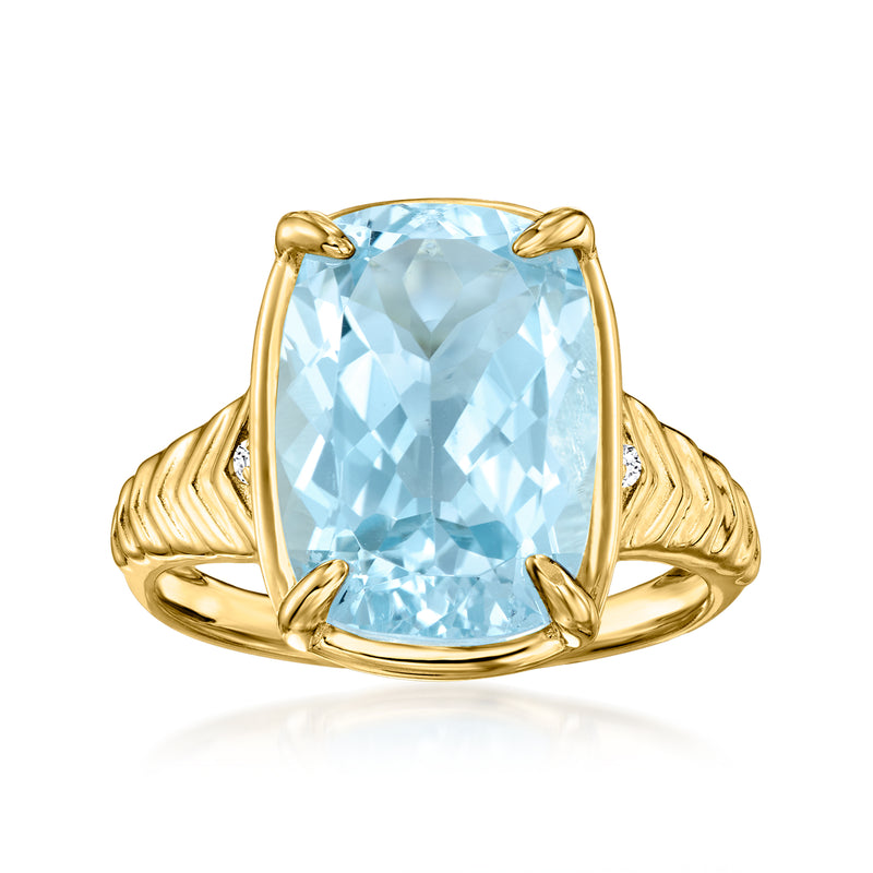 Sky blue topaz oval ring in gold-tone with diamond accents and four-prong setting