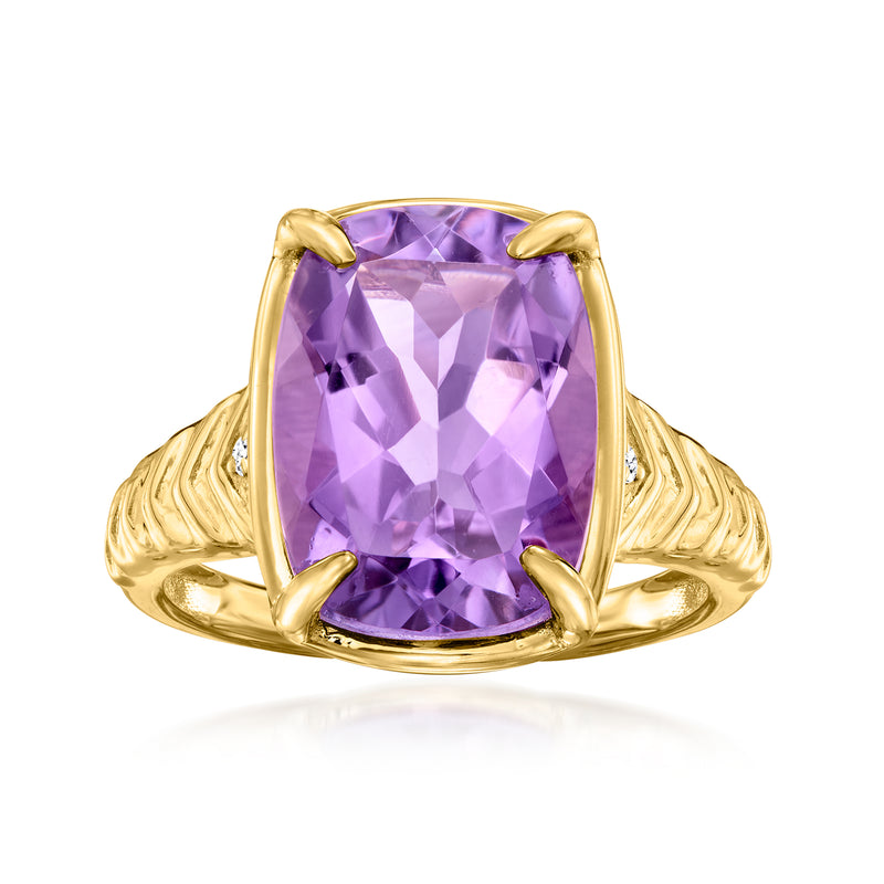 Gold ring with oval amethyst center stone and small diamond accents