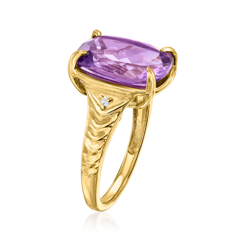 Gold ring with oval amethyst gemstone, four-prong setting, small diamond side