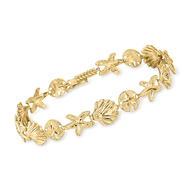Vintage 14kt yellow gold sea life link bracelet with shell, starfish, coral charms