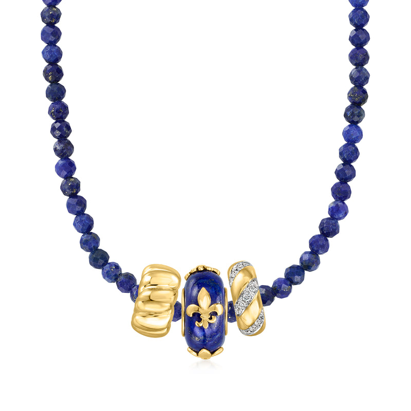 Lapis-blue bead charm with gold fleur-de-lis centerpiece on navy beaded necklace