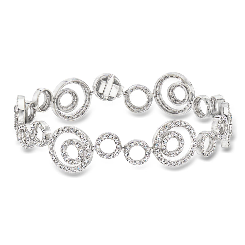 White gold diamond circle bracelet with linked round halo settings