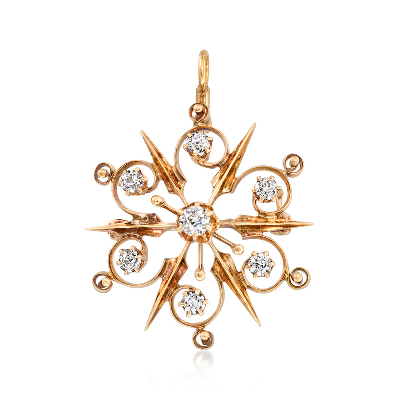14kt yellow gold snowflake pin with round diamond accents and hanging loop