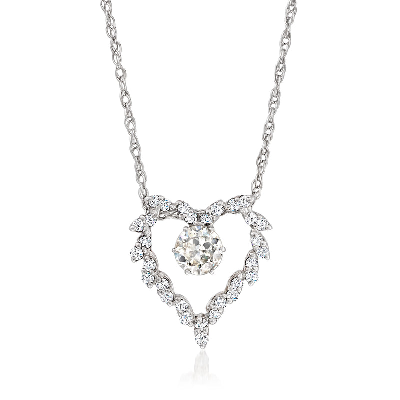Diamond heart pendant necklace in white gold with round center stone