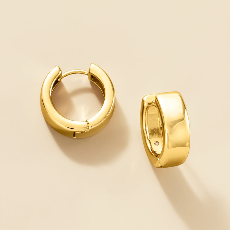 Gold-plated huggie hoop earrings, side view showing secure clasp and shine