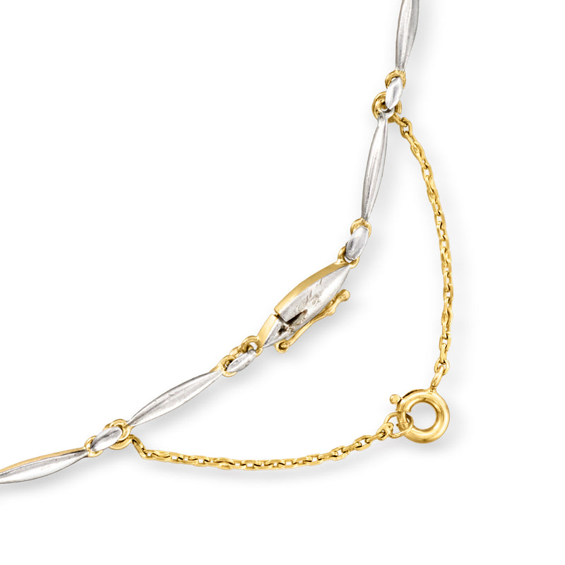 Sterling silver necklace with diamond stations and yellow gold chain extender