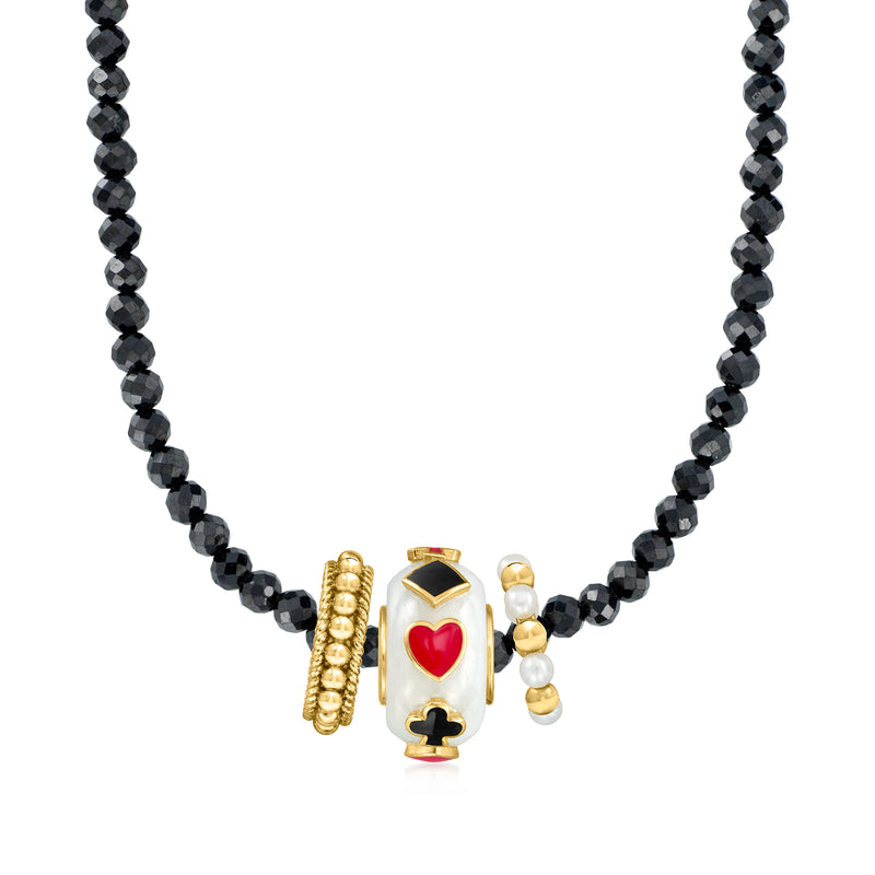 Black beaded necklace with white enamel charm and gold side accents; red heart, spade