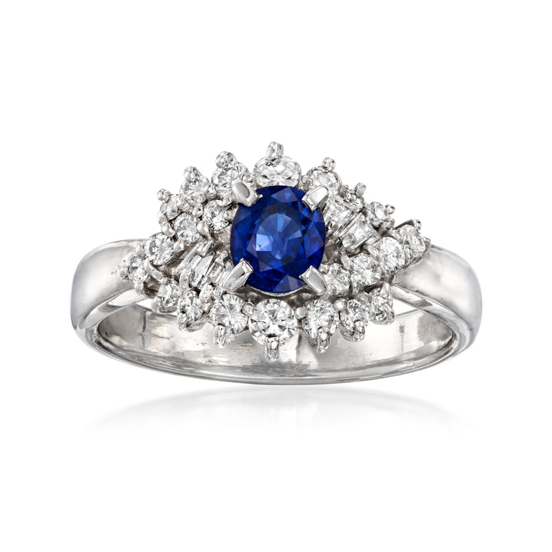 Platinum vintage sapphire and diamond halo ring with blue center stone
