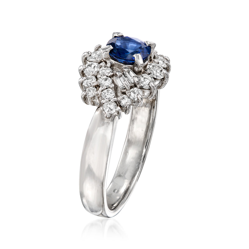 Platinum vintage sapphire and diamond cluster ring, side view with blue center