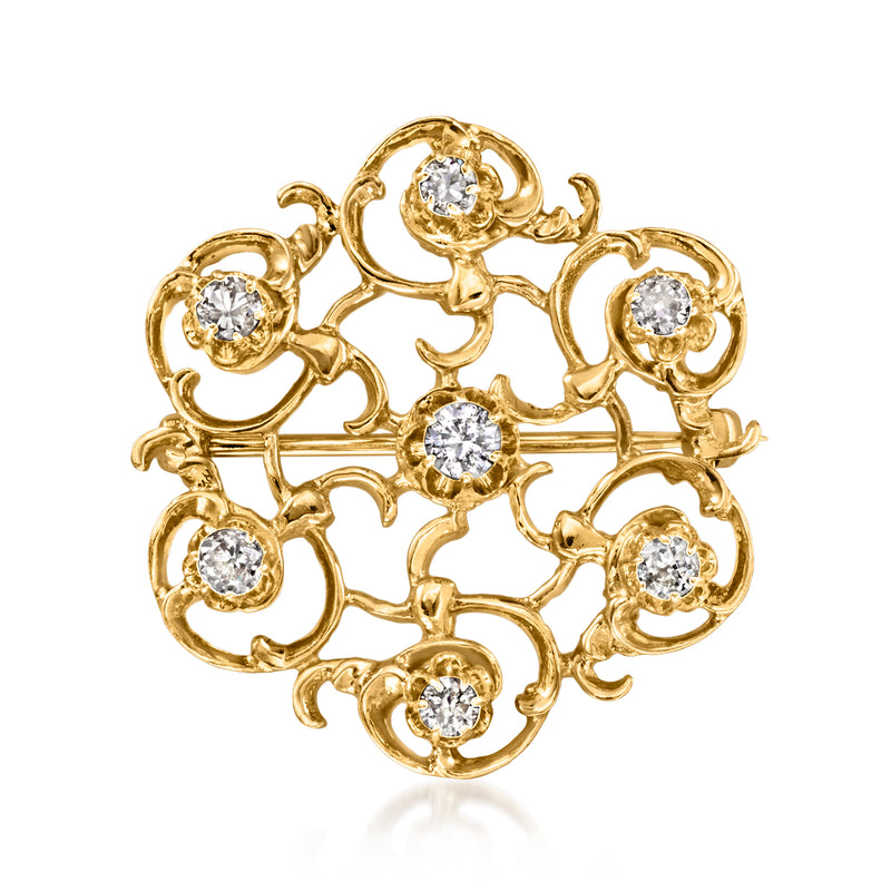 Vintage 14kt yellow gold openwork swirl pin with multiple round diamonds