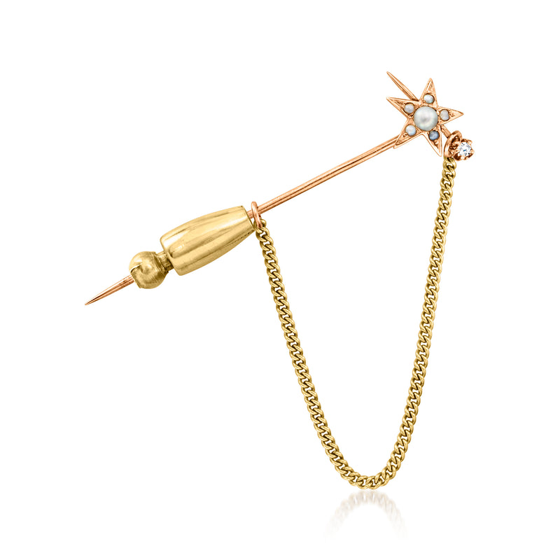Gold star stick pin with white seed pearls and small diamonds, long chain detail