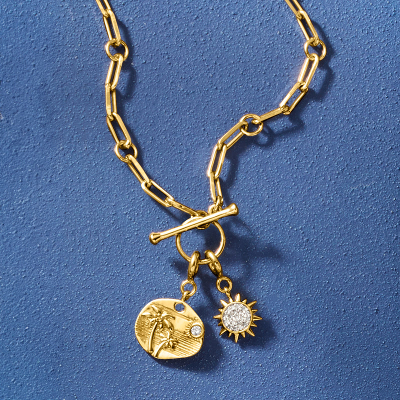 Gold chain necklace with round palm tropical charm and small diamond
