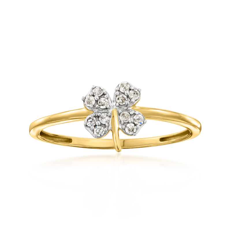 Gold four-leaf clover ring with small round diamond-like stones, openwork band