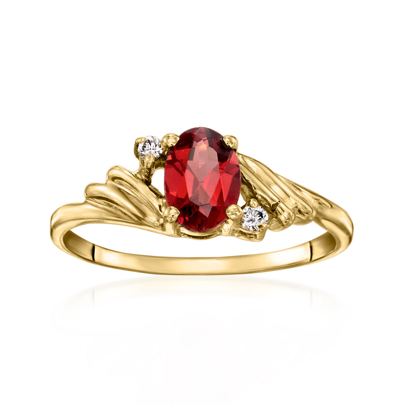 14kt yellow gold ring with oval red garnet center and small diamond accents