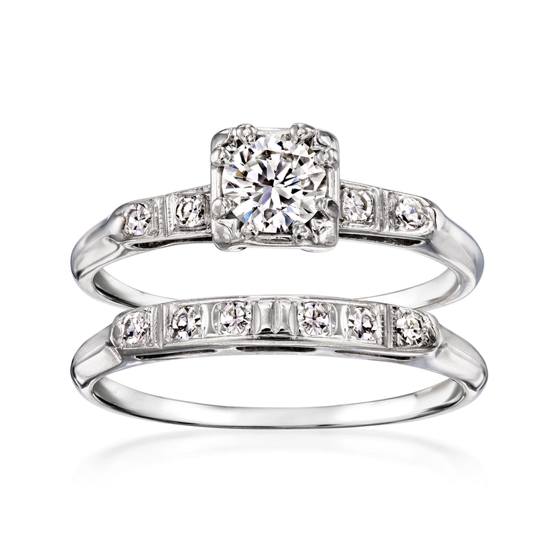 Vintage diamond bridal set in 14kt white gold, with square center stone and channel band.