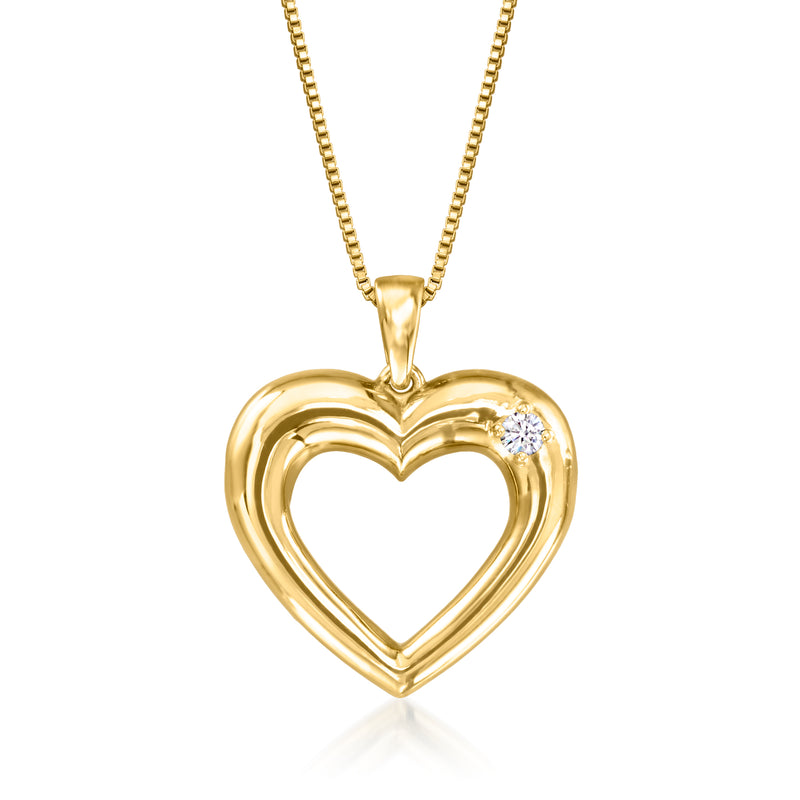 Gold heart pendant necklace with small lab diamond at top, on a gold chain