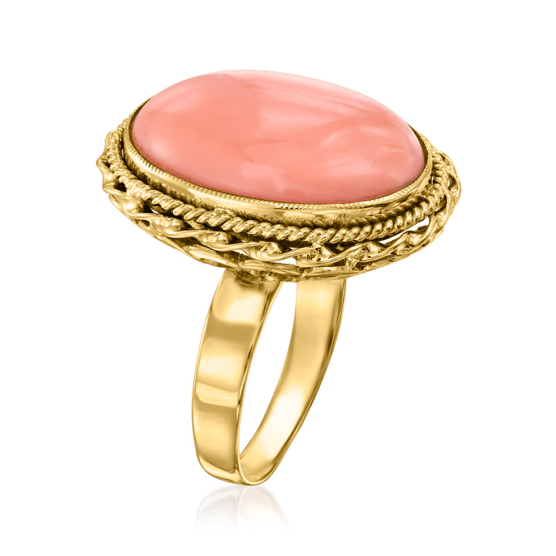 Vintage oval coral ring, 14kt yellow gold band with braided halo setting