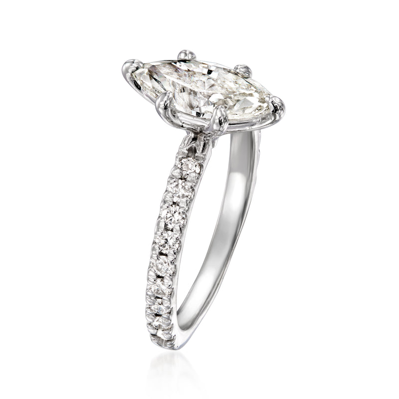 White gold diamond ring angled view, oval center stone with pave shank