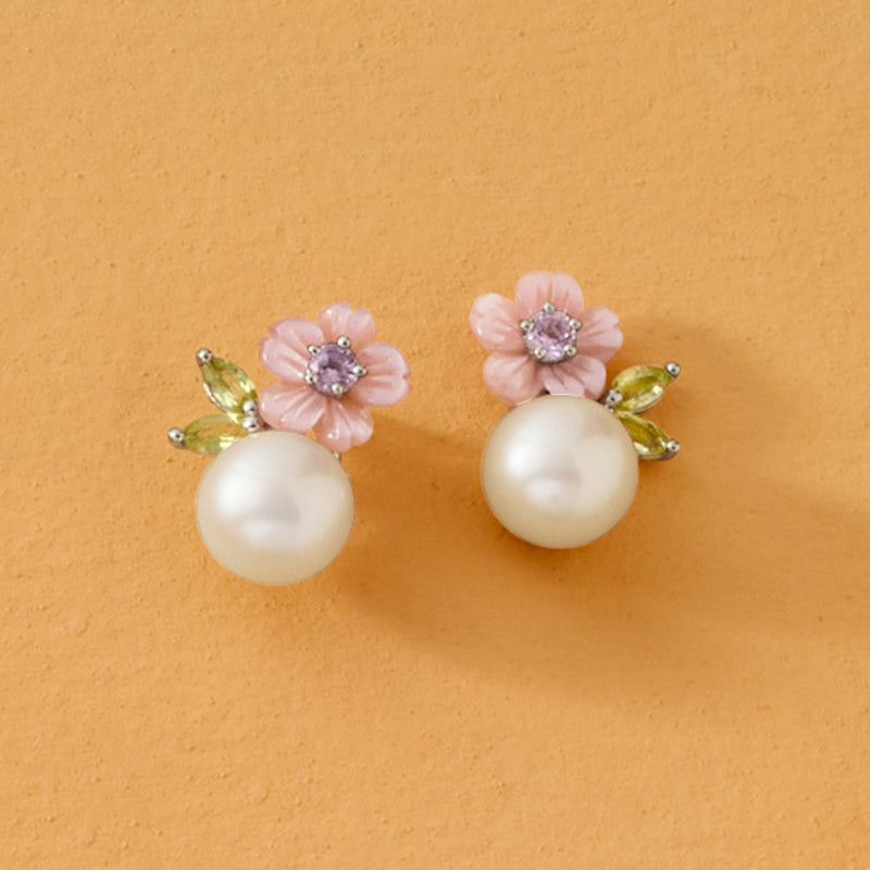 Sterling silver post earrings with pink flower tops, white pearls, amethyst stones, green accents