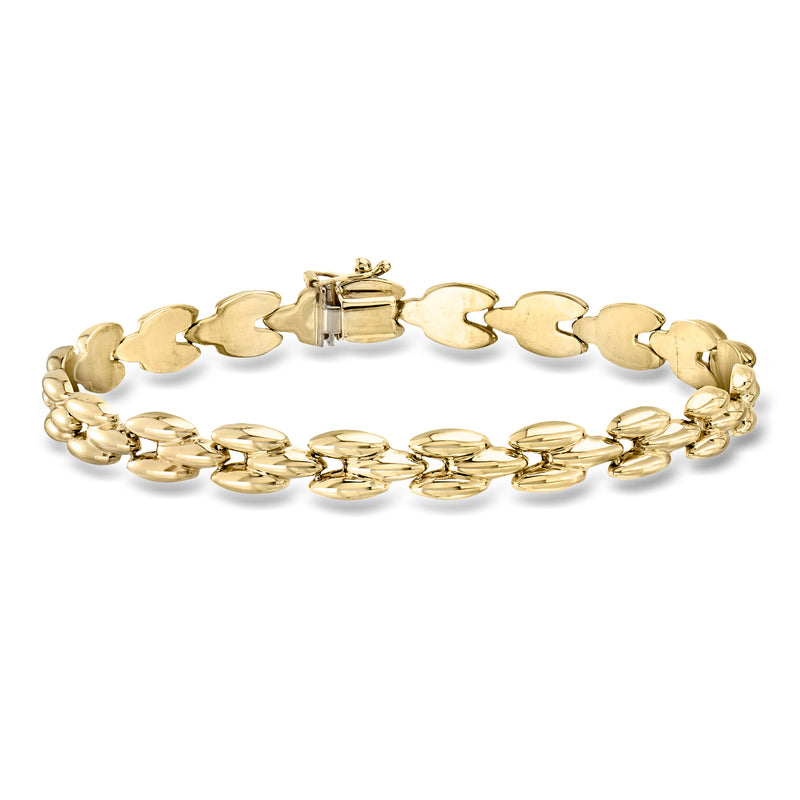Vintage 14kt yellow gold fancy-link bracelet with hinged clasp and polished links