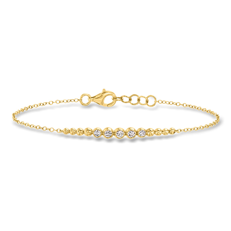 Gold ball bracelet with round lab-grown diamond accents and 18kt gold over sterling clasp