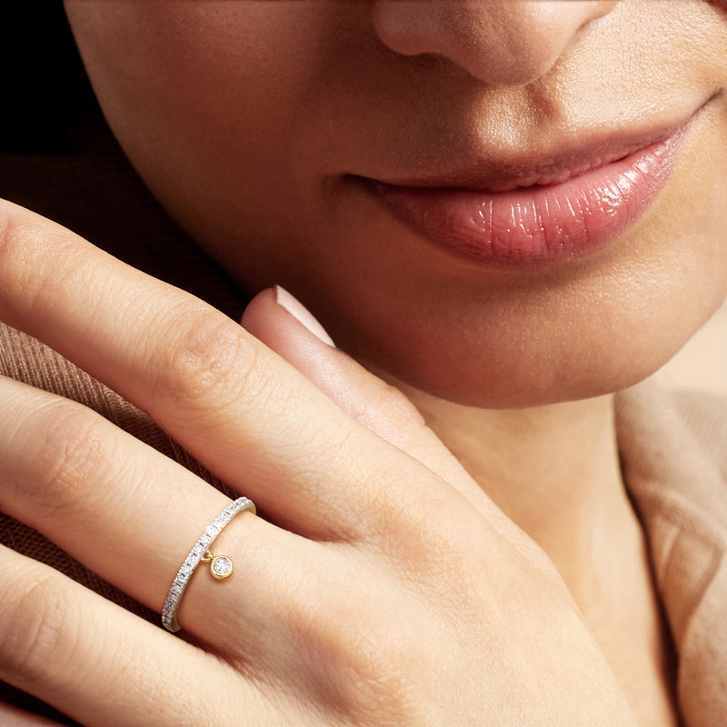 Lab-grown diamond drop ring in gold over sterling on a hand