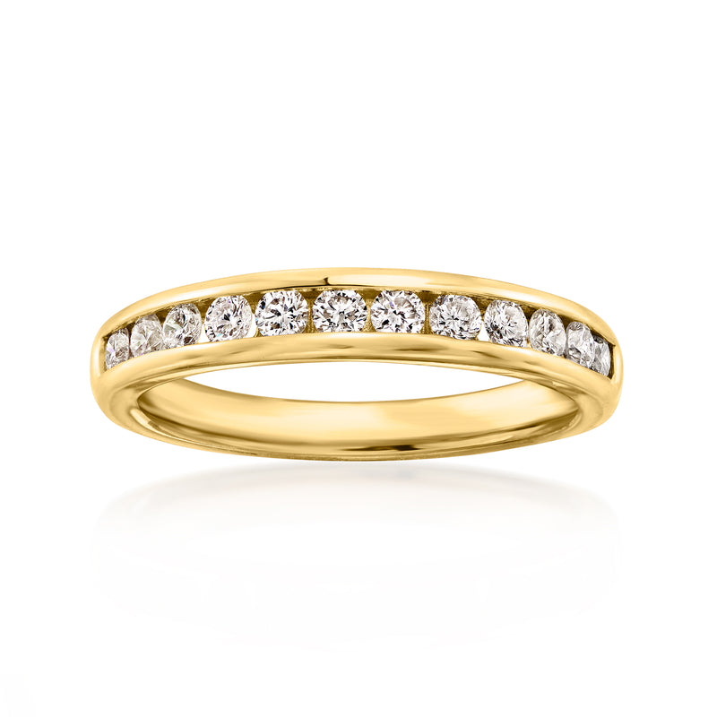 14kt yellow gold vintage diamond band ring with round stones across the top
