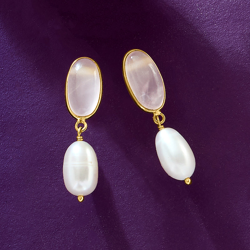 Gold drop earrings featuring oval rose quartz tops and white cultured pearl drops