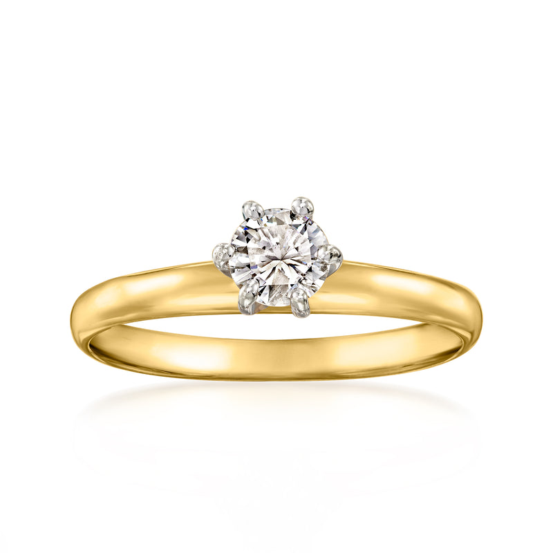 Yellow gold vintage diamond ring with round center stone and three-stone cluster