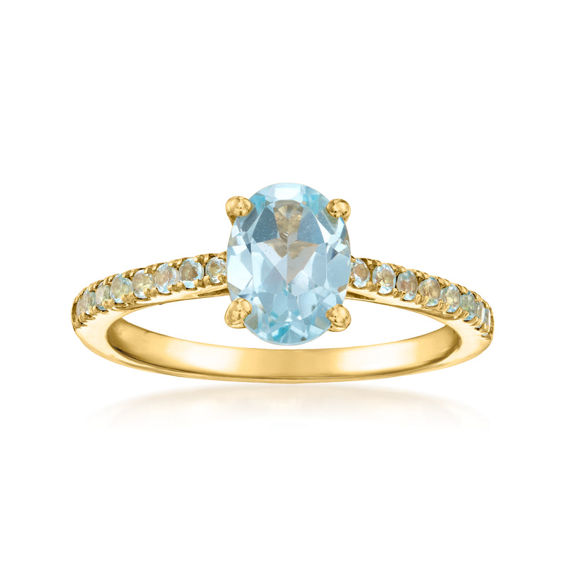 Sky blue topaz ring in gold over sterling with pavé band