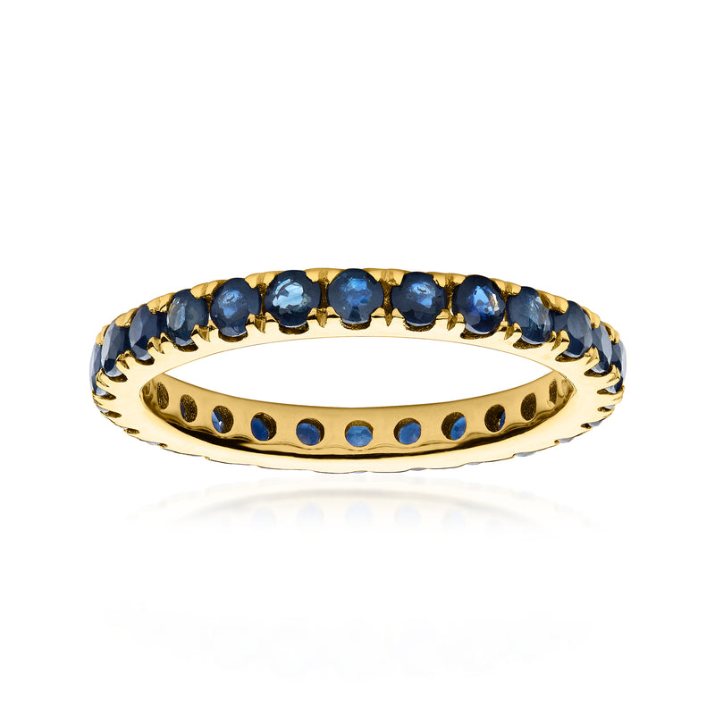 18kt gold over sterling eternity band with dark blue sapphire round stones